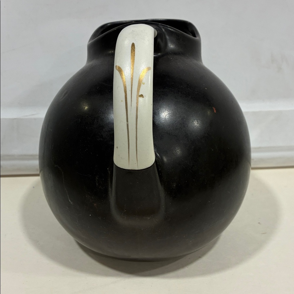 Hall’s Superior Quality Kitchenware Pitcher W/ Gold and White Handle Black Body